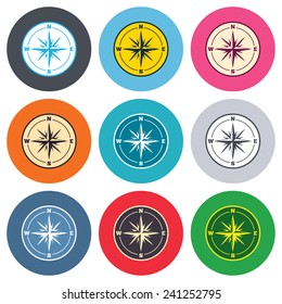Compass sign icon. Windrose navigation symbol. Colored round buttons. Flat design circle icons set. Vector