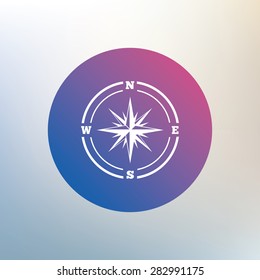 Compass sign icon. Windrose navigation symbol. Icon on blurred background. Vector