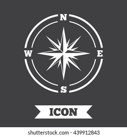 Compass sign icon. Windrose navigation symbol. Graphic design element. Flat windrose compass symbol on dark background. Vector