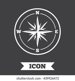 Compass sign icon. Windrose navigation symbol. Graphic design element. Flat windrose compass symbol on dark background. Vector