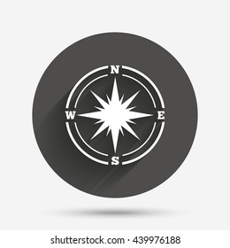 Compass sign icon. Windrose navigation symbol. Circle flat button with shadow. Vector