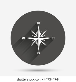 Compass sign icon. Windrose navigation symbol. Circle flat button with shadow. Vector