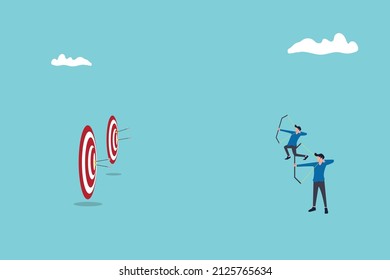 competition concept, three businessmen holding bows and arrows to shoot bullseye. Symbol of business goals, aims, mission, opportunity and challenge