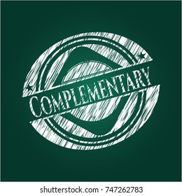 Complementary written on a blackboard