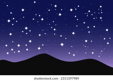 complete constellations at night behind the mountains
