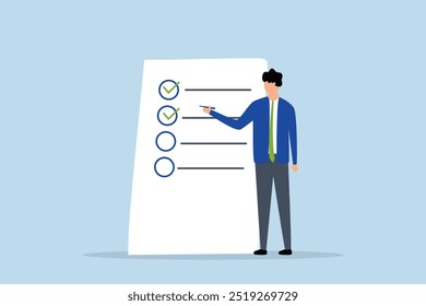 Completed checklist, Businessman is using a pen to review the project list and tick off the checkbox labeled as completed.