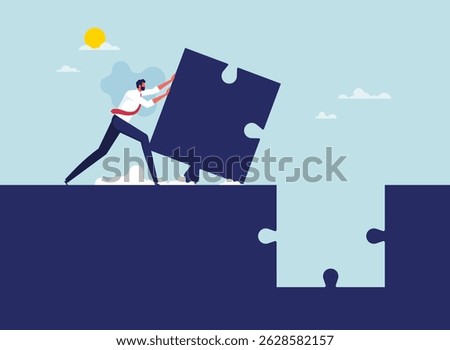 Completion mission concept, businessman pushing the final piece of puzzle