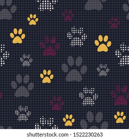 Complex illustration print in yellow, burgundy, white, grey and black. Seamless pattern with cats and dogs paw prints on grid background. Perfect for gifts, wallpaper, fabric and scrapbooking.