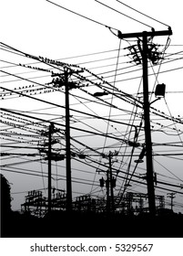 A complex maze of telephone poles and wires