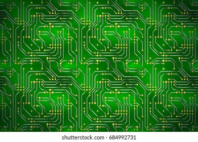 Complicated computer microchip with golden contacts on green motherboard, horizontal background