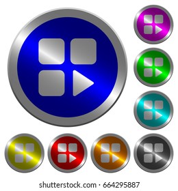 Component play icons on round luminous coin-like color steel buttons