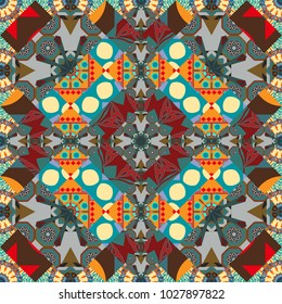 Composed in brown, gray and blue colors, abstract shapes, Mandalas. Vector illustration. Useful as design element for texture and artistic compositions. Kaleidoscope seamless pattern.