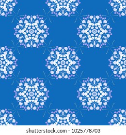 Composed of white, blue and violet abstract elements. Useful as design element for texture and artistic compositions. Mandalas kaleidoscope seamless pattern. Vector illustration.