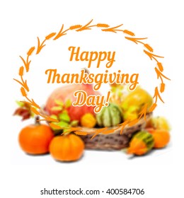 Composition with Autumn leaves, pumpkins and berries. Blurred background made with mesh. Caption "Happy Thanksgiving! Day!", space for your text. 