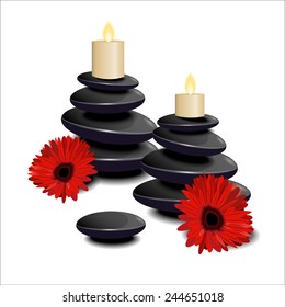 The composition of black stones, candles and red flowers on a white background. Spa.