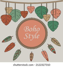 Composition in boho style. Macrame leaves and feathers in retro colors