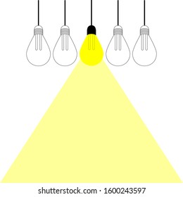 Composition. A burning light bulb in the center against a background of gray. Idea concept