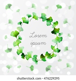 Composition with circle of green ginkgo leaves on white glowing background with place for your text. Traditional Japanese ink painting sumi-e.