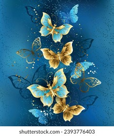 Composition of flying, jewelry, gold and dark butterflies on textured jewelry background. Golden butterfly.