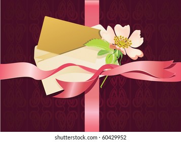 composition of letter, pink ribbon and flower.