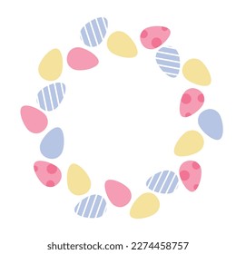 Composition of multi-colored painted Easter eggs laid out in the form of a wreath