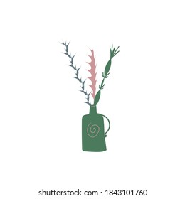 Composition of prickly branches in the green vase.