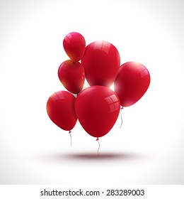 Composition of red ballons, greeting and holiday concept