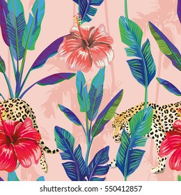 Composition of the tropical green banana leaves, red hibiscus flower, wild animal leopard, pink palm background. Seamless wallpaper pattern