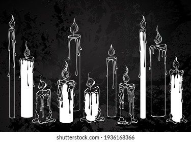 Composition of white, contour candles on black textured background.