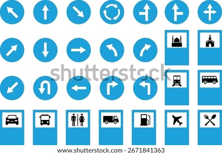 A comprehensive set of blue and white traffic and public service signs, including directional arrows and facility icons like restrooms, gas, and transport.