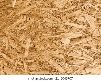 Compressed chipboard background. Wood plank texture. OSB Texture