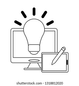 computer with bulb light and tabler with pen black and white