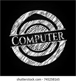 Computer chalkboard emblem on black board