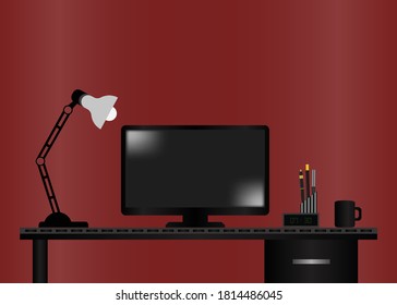 Computer desk with night lamp digital watch, pen stand, and cup of tea