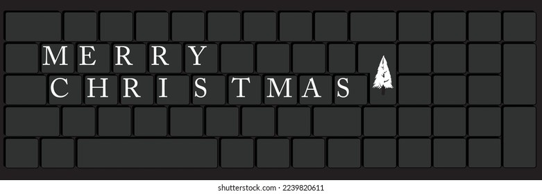 Computer Keyboard with Merry Christmas text. Close-up of an electronic Computer Device part, keypad.