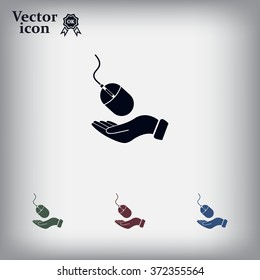 Computer mouse on hand icon, vector illustration. Flat design style