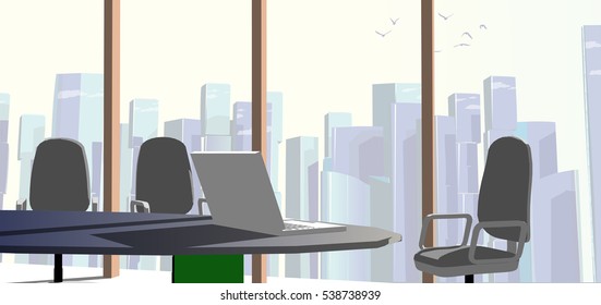 computer in the office in front of a large window
