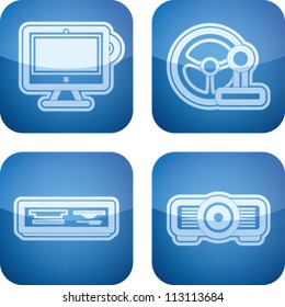Computer parts and accessories, pictured here from left to right:  All-in-one computer, Game Steering wheel, Multimedia card reader, Projector.