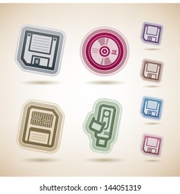Computer parts and accessories, pictured here from left to right, top to bottom:   3,5' diskette, CD-ROM disk, Memory Card, Pen Drive.