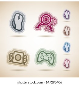 Computer parts and accessories, pictured here from left to right, top to bottom:   Computer mouse, Internet Camera, Computer speakers, Game pad. 