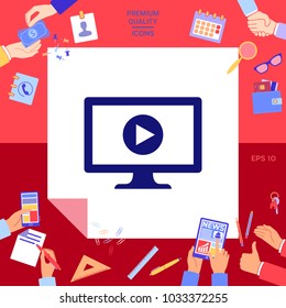 Computer with play button icon