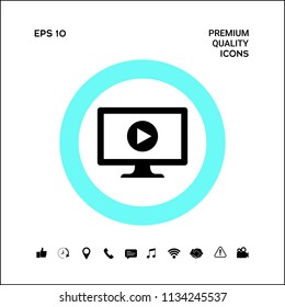 Computer with play button icon