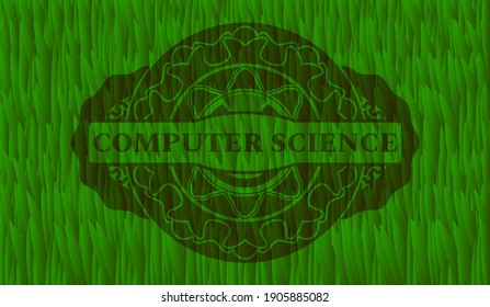 Computer science text inside green grama grass realistic emblem. Eco chic background. Intense illustration. 