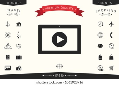 Computer tablet with play button icon