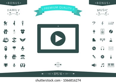 Computer tablet with play button icon