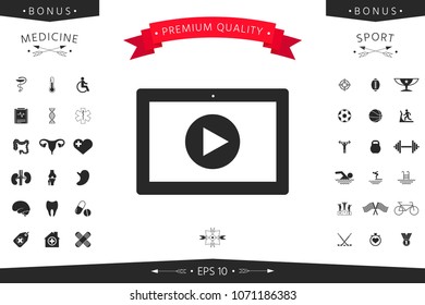 Computer tablet with play button icon