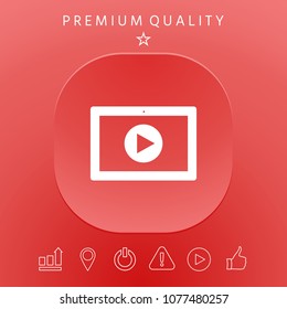 Computer tablet with play button icon