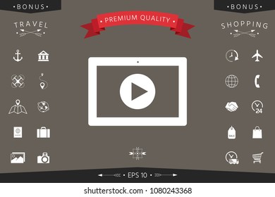 Computer tablet with play button icon