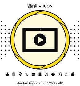 Computer tablet with play button icon