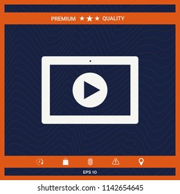 Computer tablet with play button icon